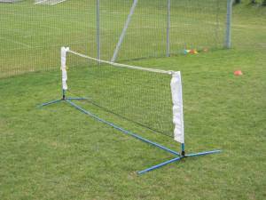 Soccer system to improve aerial dribbling, complete with net.