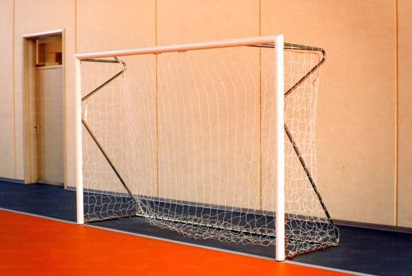 Steel futsal goals 300x200 cm., standing in ground sockets, complete with hinged net supports.